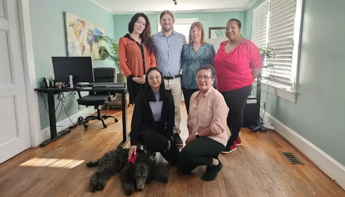 Company Photo With Dog