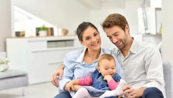 Parents Holding Baby In Home Parents Holding Baby In Home